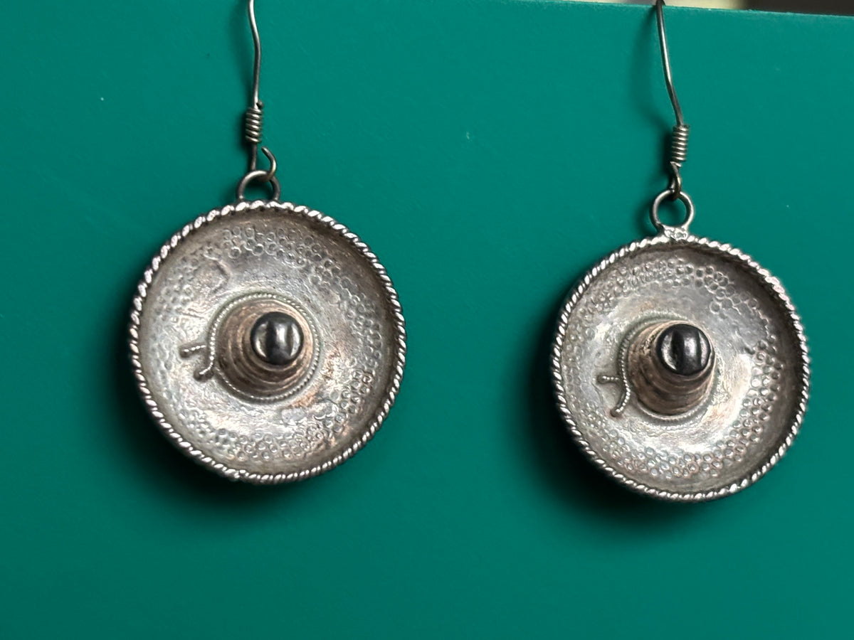 view of both earrings hanging 