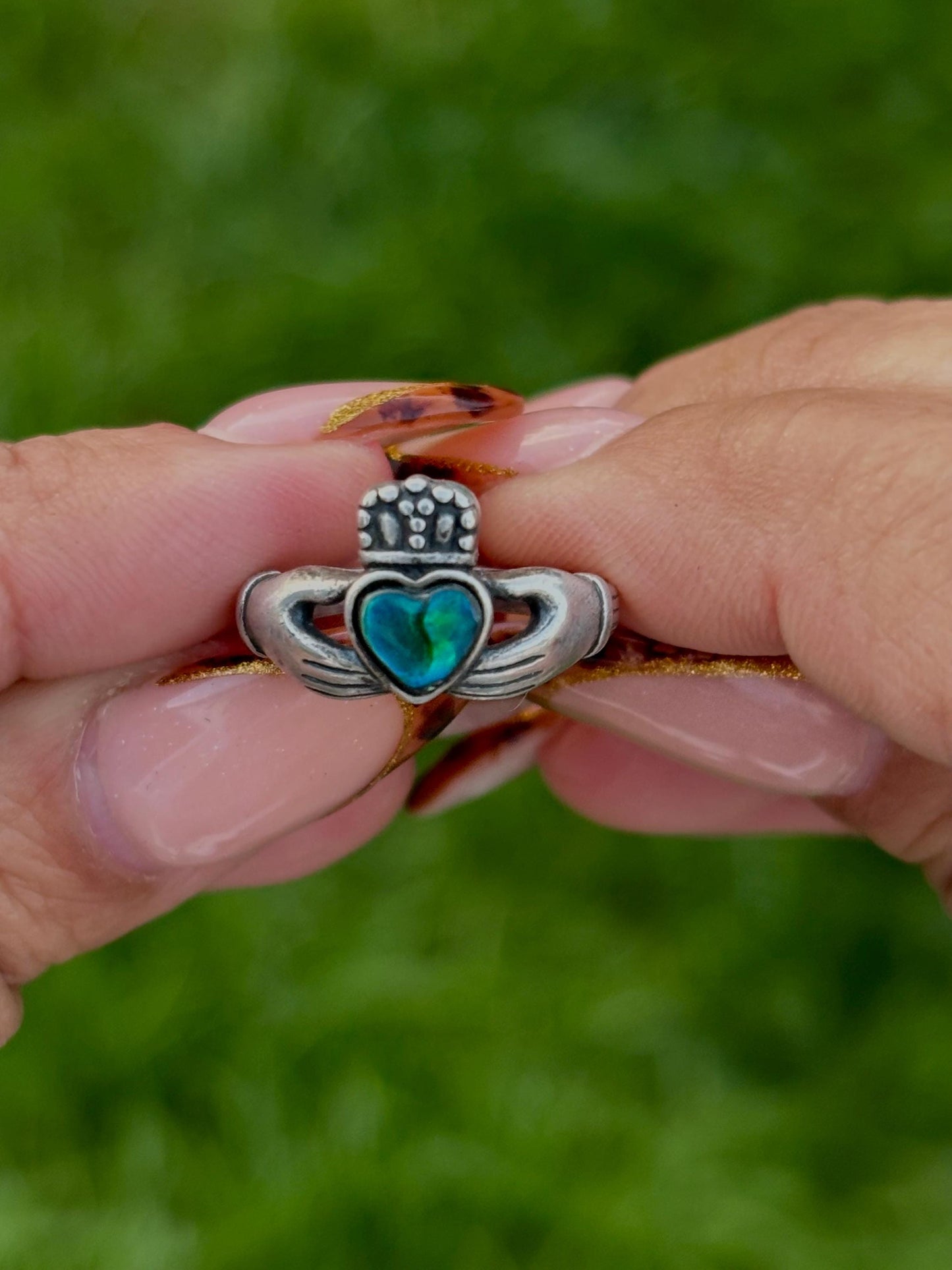 Sterling Silver Claddagh Ring with Blue-Green Heart Accent Stone – Size 4.75