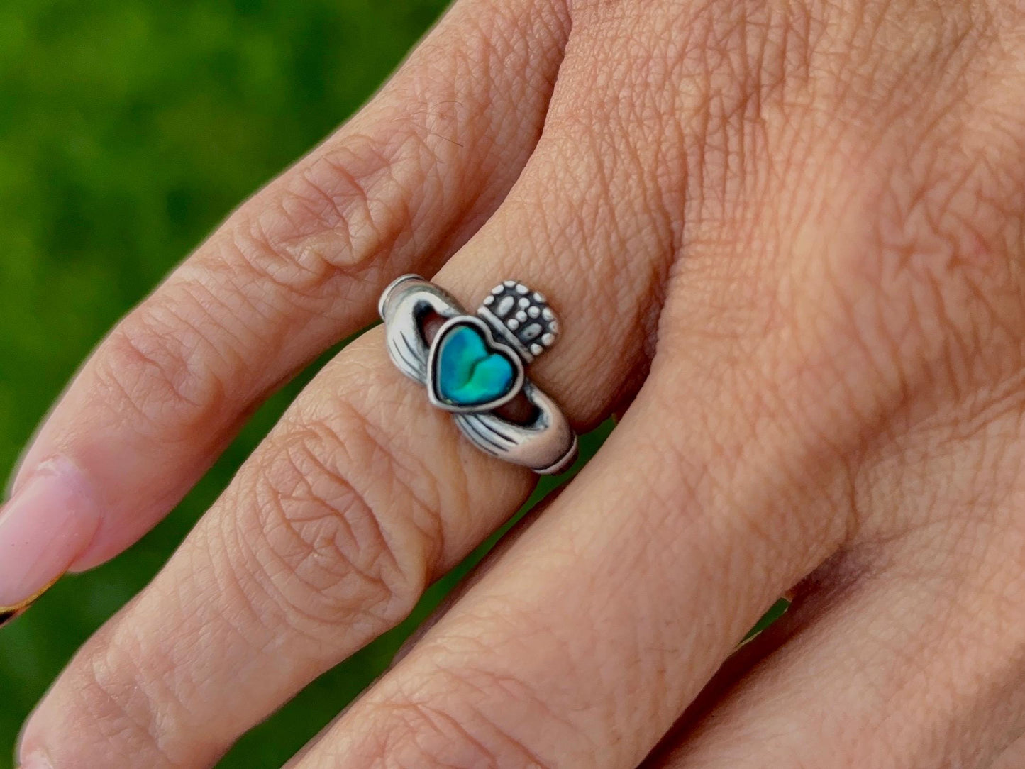 Sterling Silver Claddagh Ring with Blue-Green Heart Accent Stone – Size 4.75