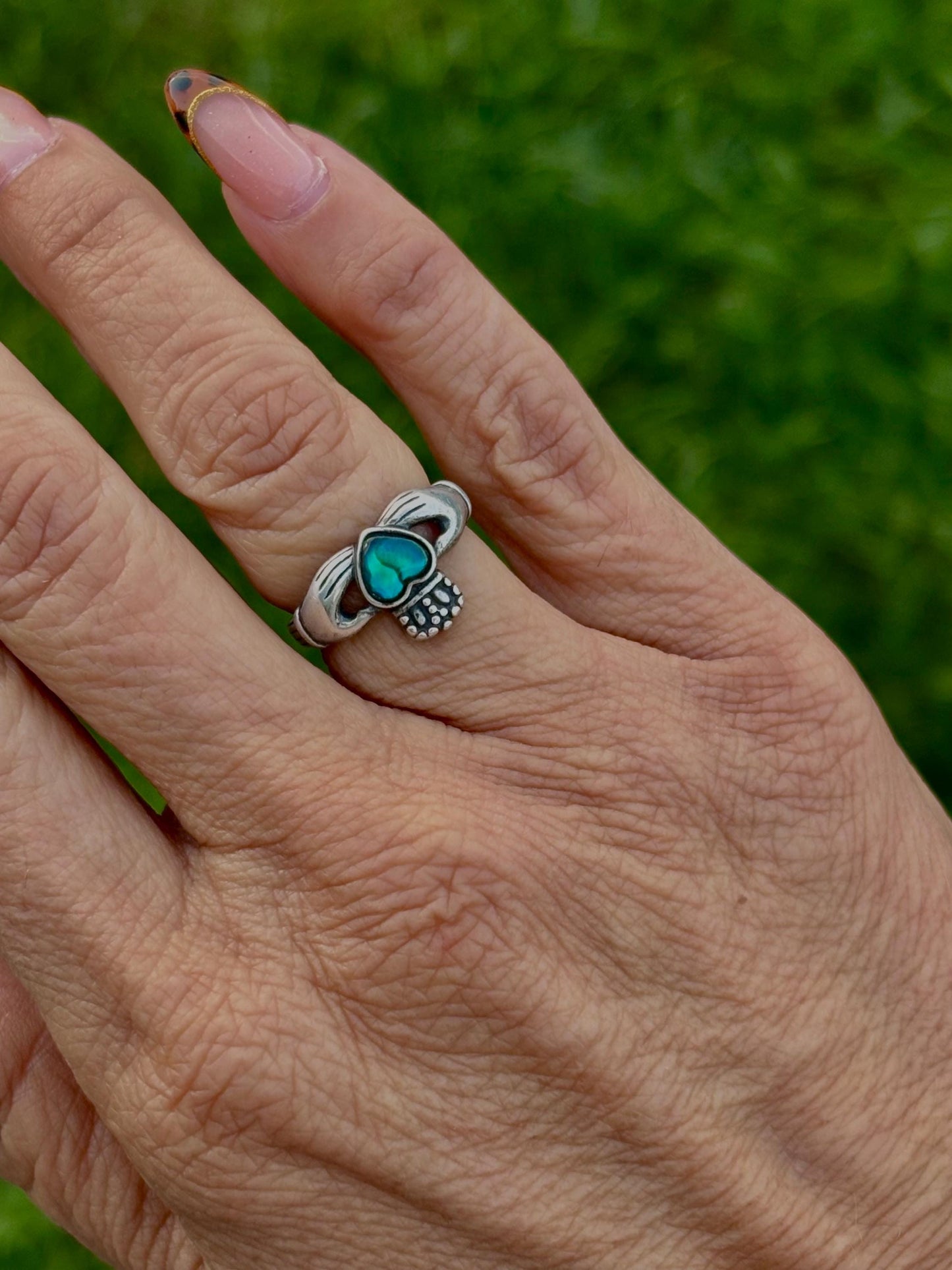 Sterling Silver Claddagh Ring with Blue-Green Heart Accent Stone – Size 4.75